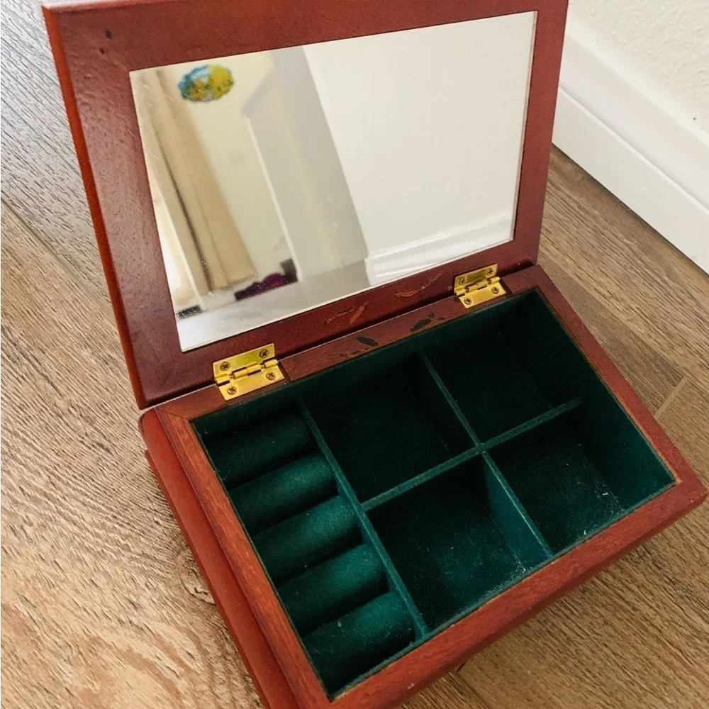 Wooden box with a mirror